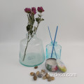 إعادة تدوير مزهرية الزجاج الأزرق لحفل الزفاف